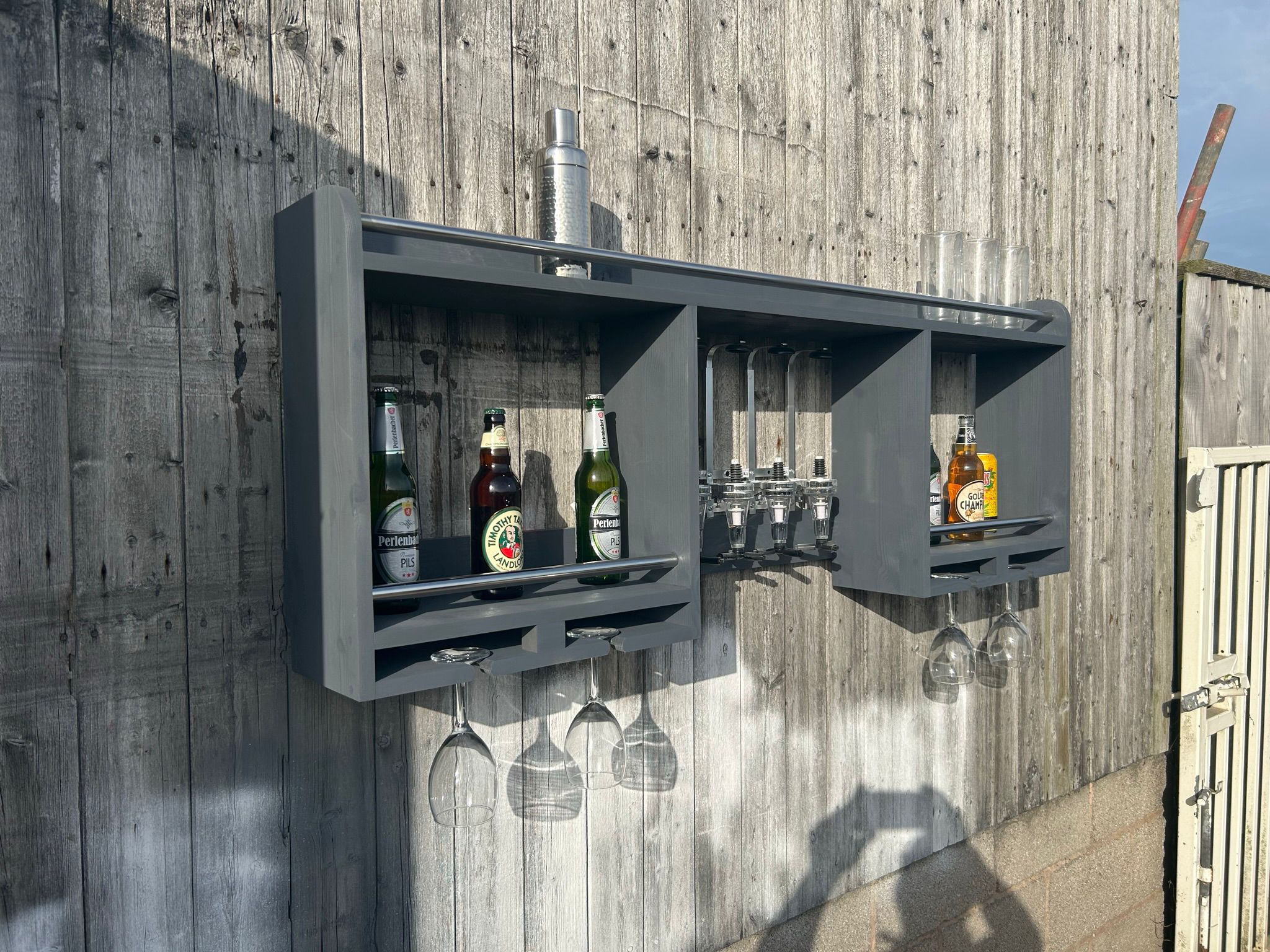 Grey Daiquiri floating shelf mounted on walln for drinks