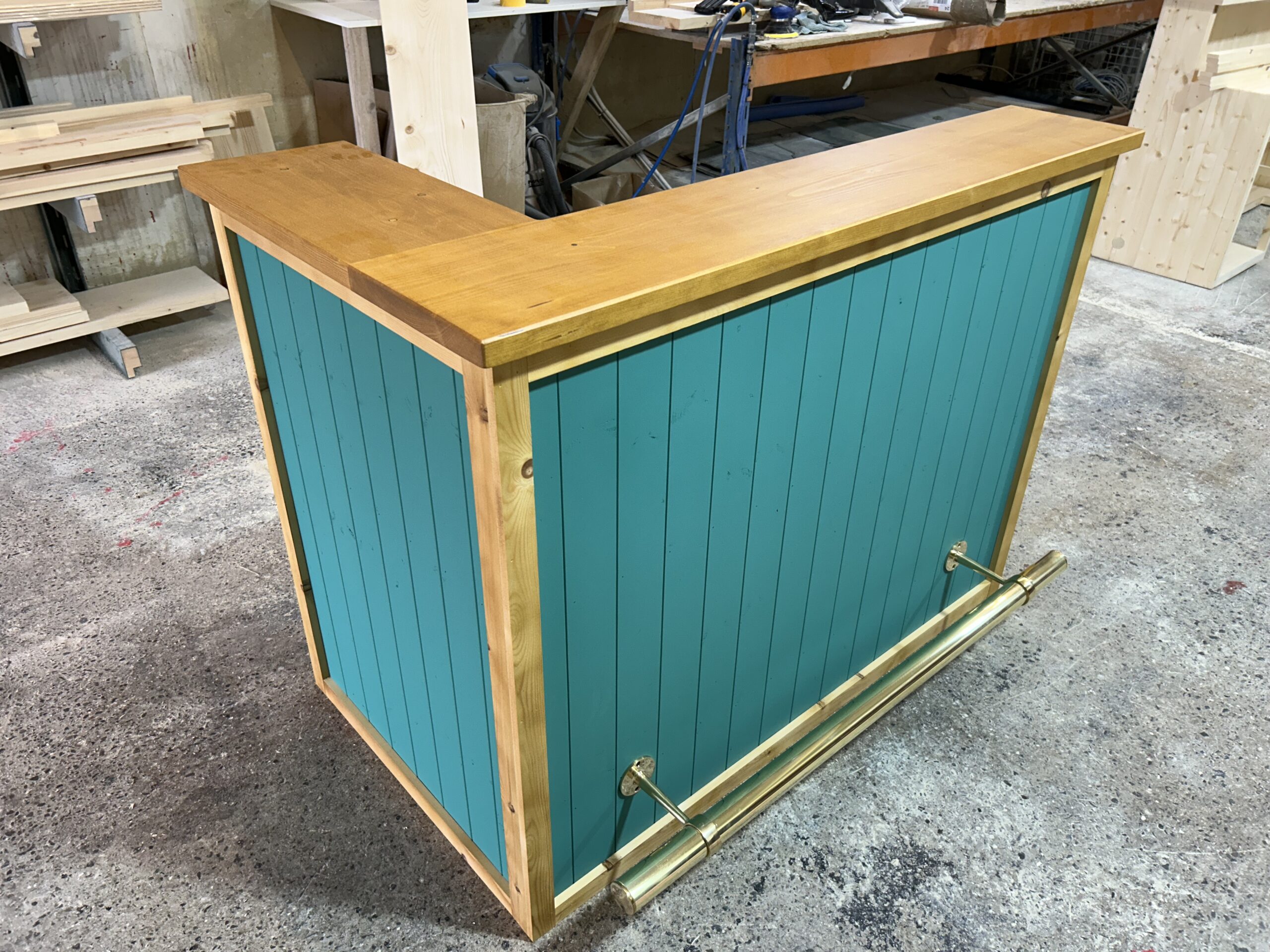Vibrant corner entertaining with Vintage Satin Edge Teal Martini 140x80 L-shape home bar and foot rail