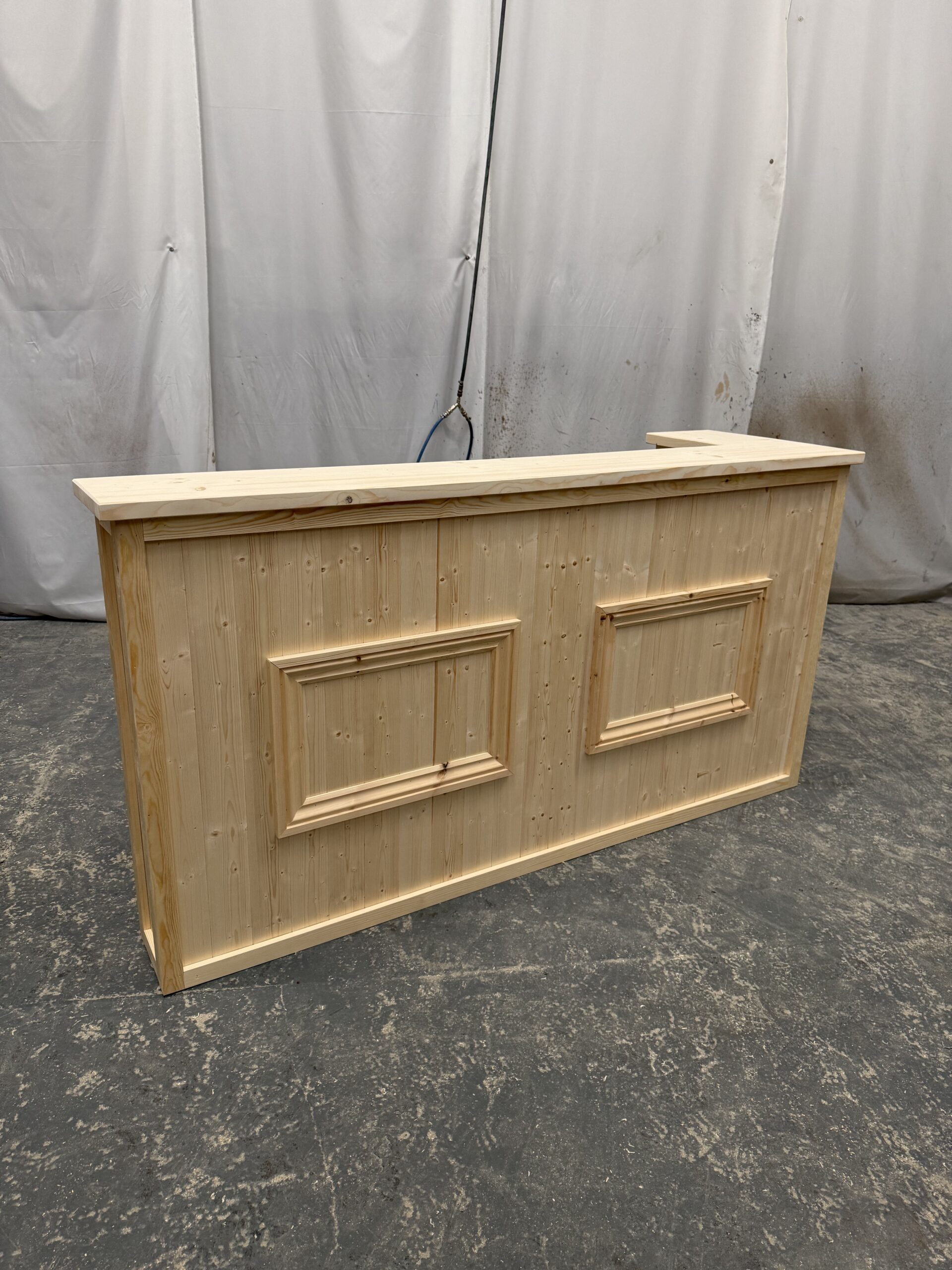 handmade home bar with shelving and decorative trim