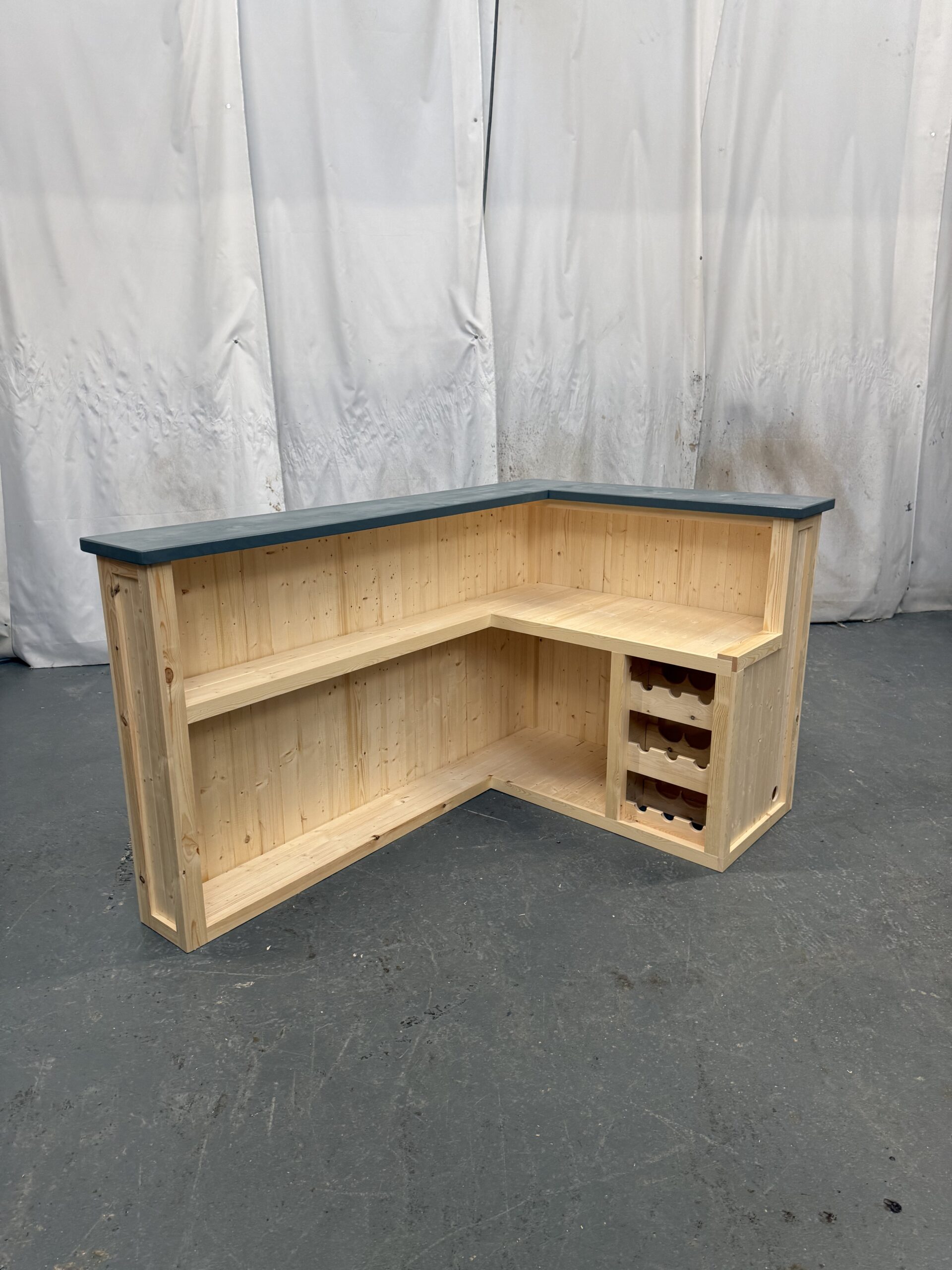 Integrated wine rack holding 9 bottles on Slate Satin Martini home bar